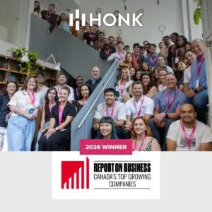 The HONK team photographed on the stairs of their Toronto office, with the 2026 Report on Business Canada’s Top Growing Companies winner badge